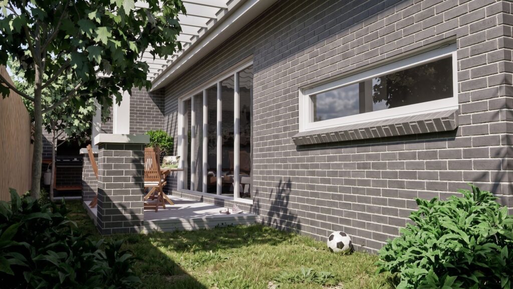 Dark brick alfresco courtyard at the renovated Frankston bungalow