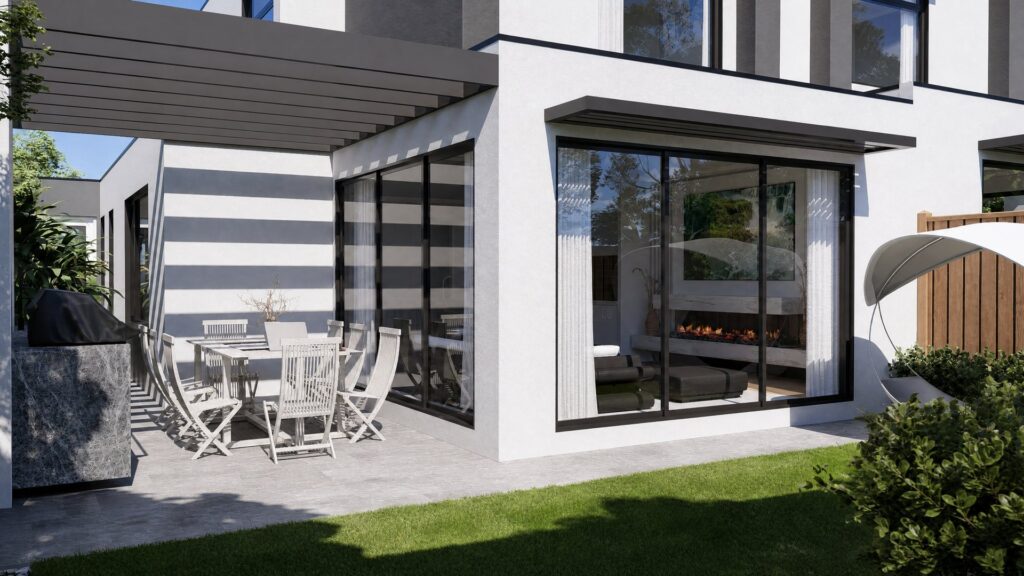 Rear alfresco area at the Highett dual occupancy development with covered pergola, outdoor dining setting and indoor-outdoor fireplace